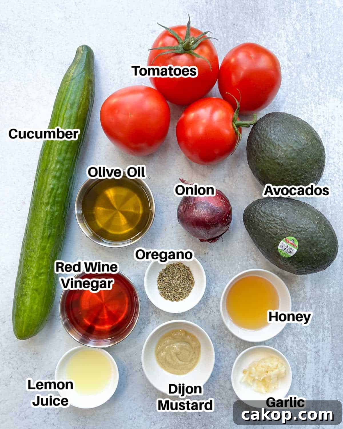 Creamy Avocado and Tomato Salad with Lime and Basil 3 Ingredients to make avocado tomato salad laid out.