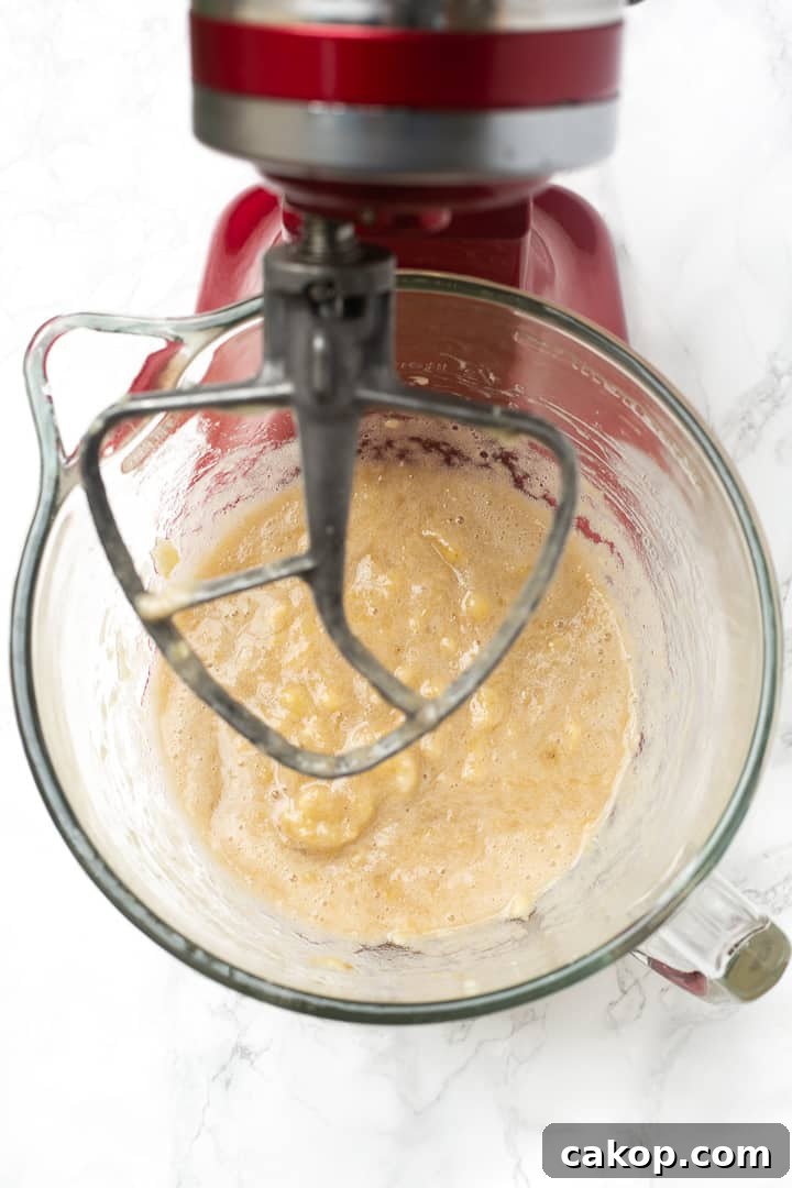 Healthy Banana Nut Bread! Less than 200 calories per slice and it's perfectly moist. whole wheat banana bread batter