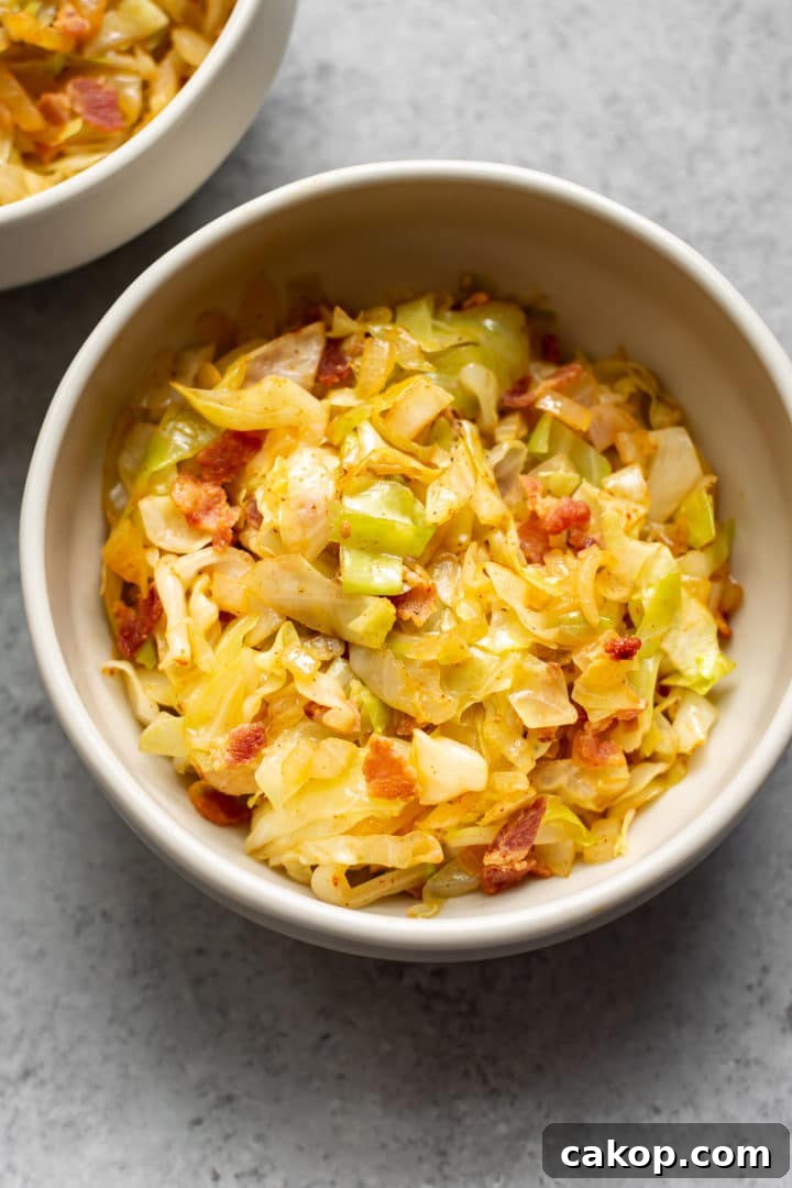 cabbage with bacon and onions in two bowls