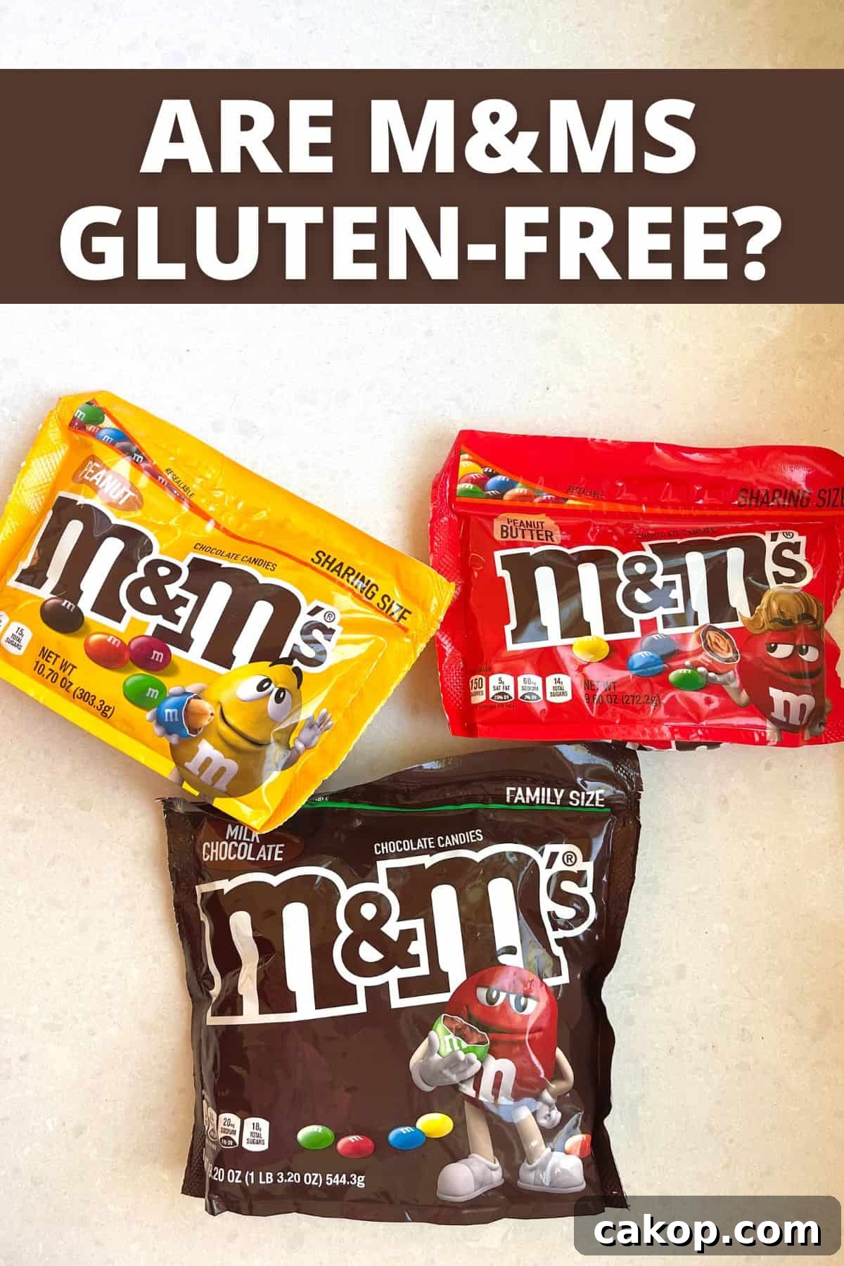 3 bags of M&Ms on white counter