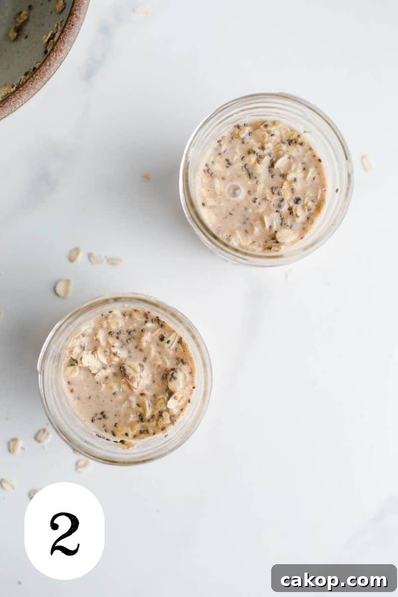 Oat mixture in two mason jars. 