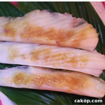 5 patoli served on turmeric leaves.