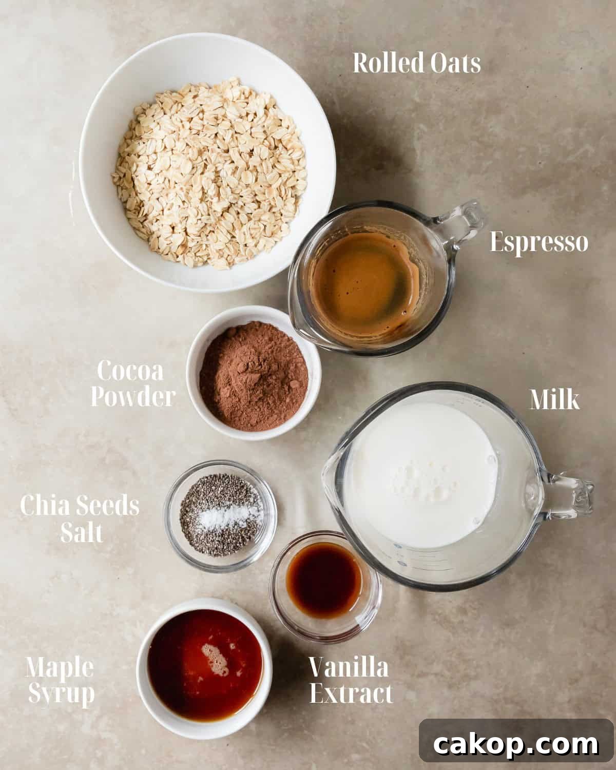 Chocolate Espresso Oats: Gather oats, chia seeds, cocoa powder, salt, espresso, milk, vanilla extract and maple syrup.