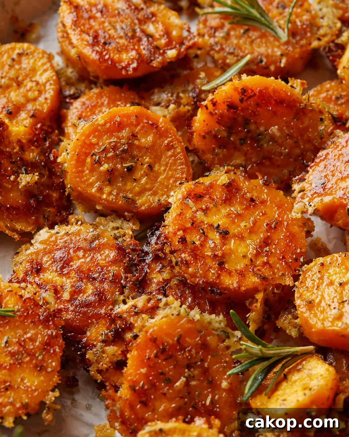 Up close overhead image of savory sweet potatoes with garnish. 