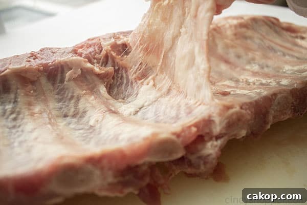 Removing membrane from pork ribs