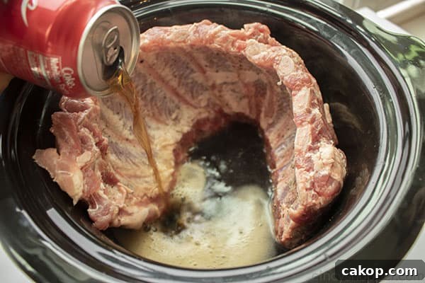 Addign Coke to ribs in slow cooker