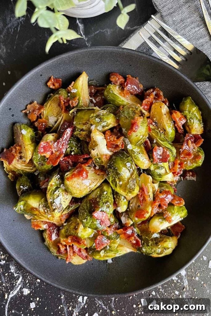 Roasted Brussels Sprouts with Bacon and Honey-Butter Glaze 10 A bowl of Roasted brussels sprouts with honey butter and bacon.