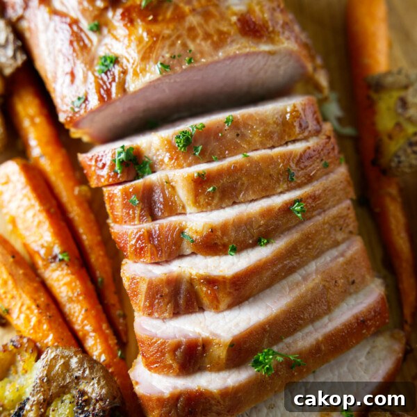 Double-Smoked Ham Recipe: How to Smoke Perfect Ham at Home 16 sliced whole smoked pork loin on cutting board