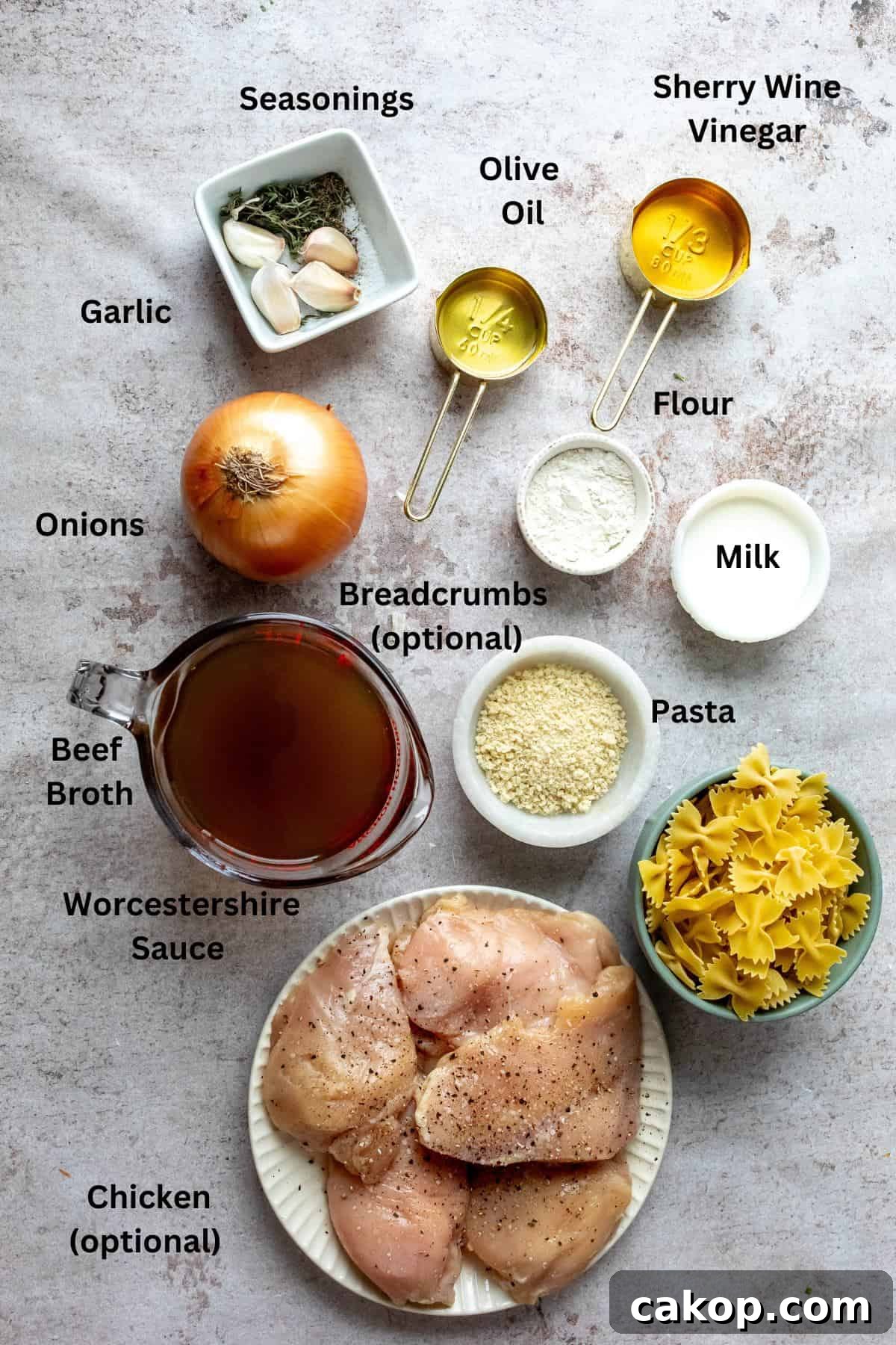 French Onion Pasta Recipe: Creamy Caramelized Onion Noodle Bake 3 All ingredients needed to make the recipe in small bowls and measuring cups.