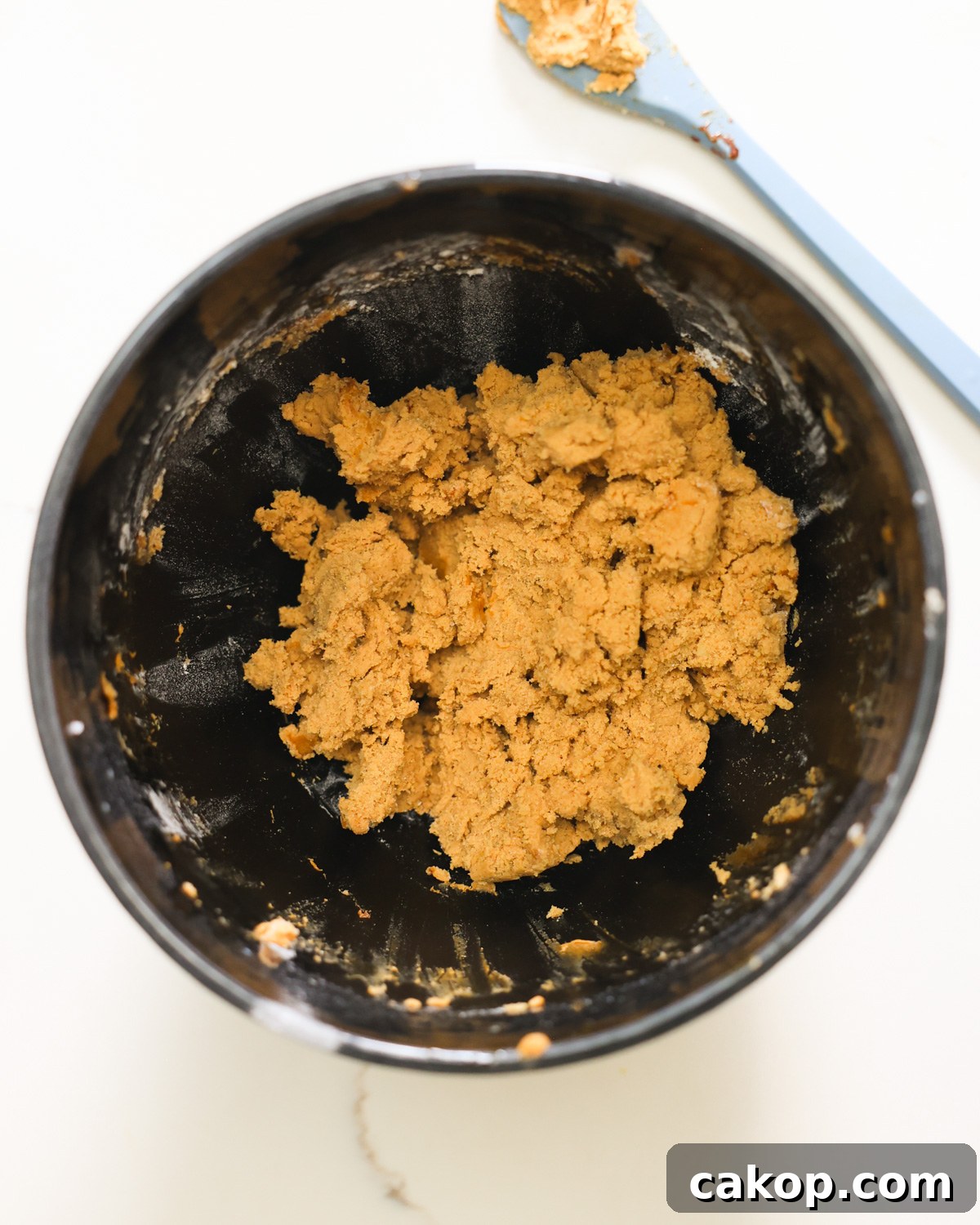 overhead gingerbread cookie dough in bowl