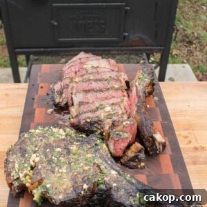 One sliced and one whole Grilled Ribeye with Cowboy Butter.