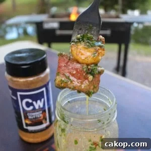 The tender steak and juicy shrimp are dipped in the Cowboy Butter, which is next level freakin' delicious!
