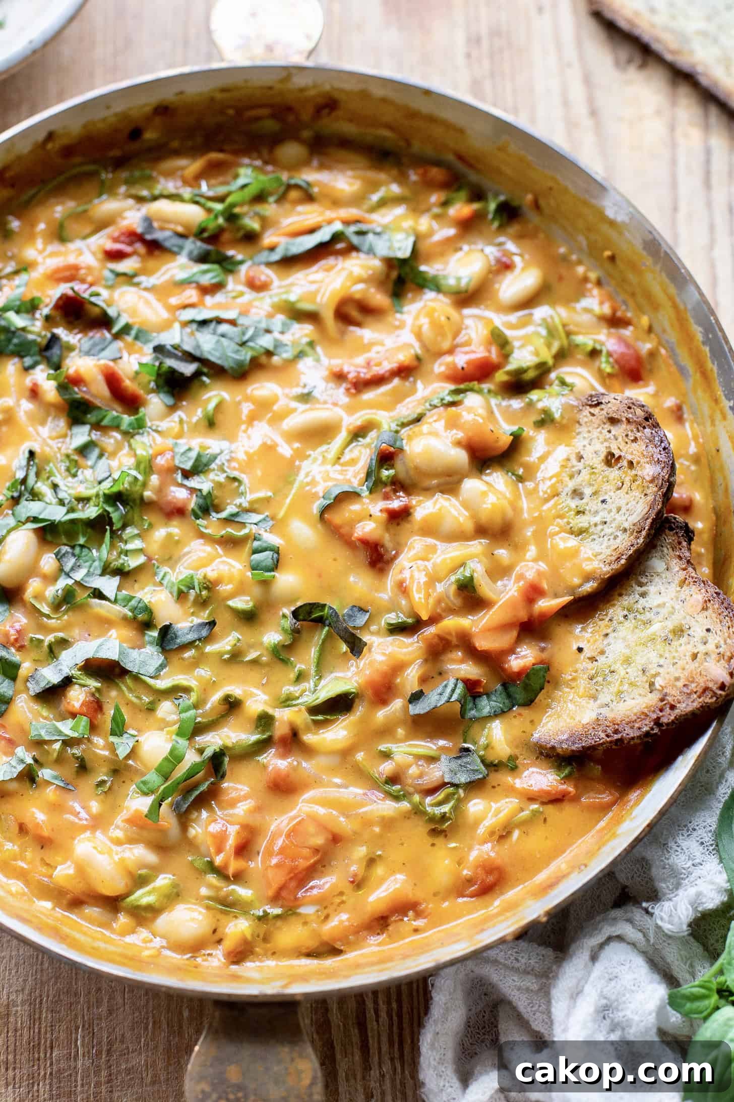 25 Comforting Winter Stews to Warm You Up 13 Creamy Tomato White Bean Stew