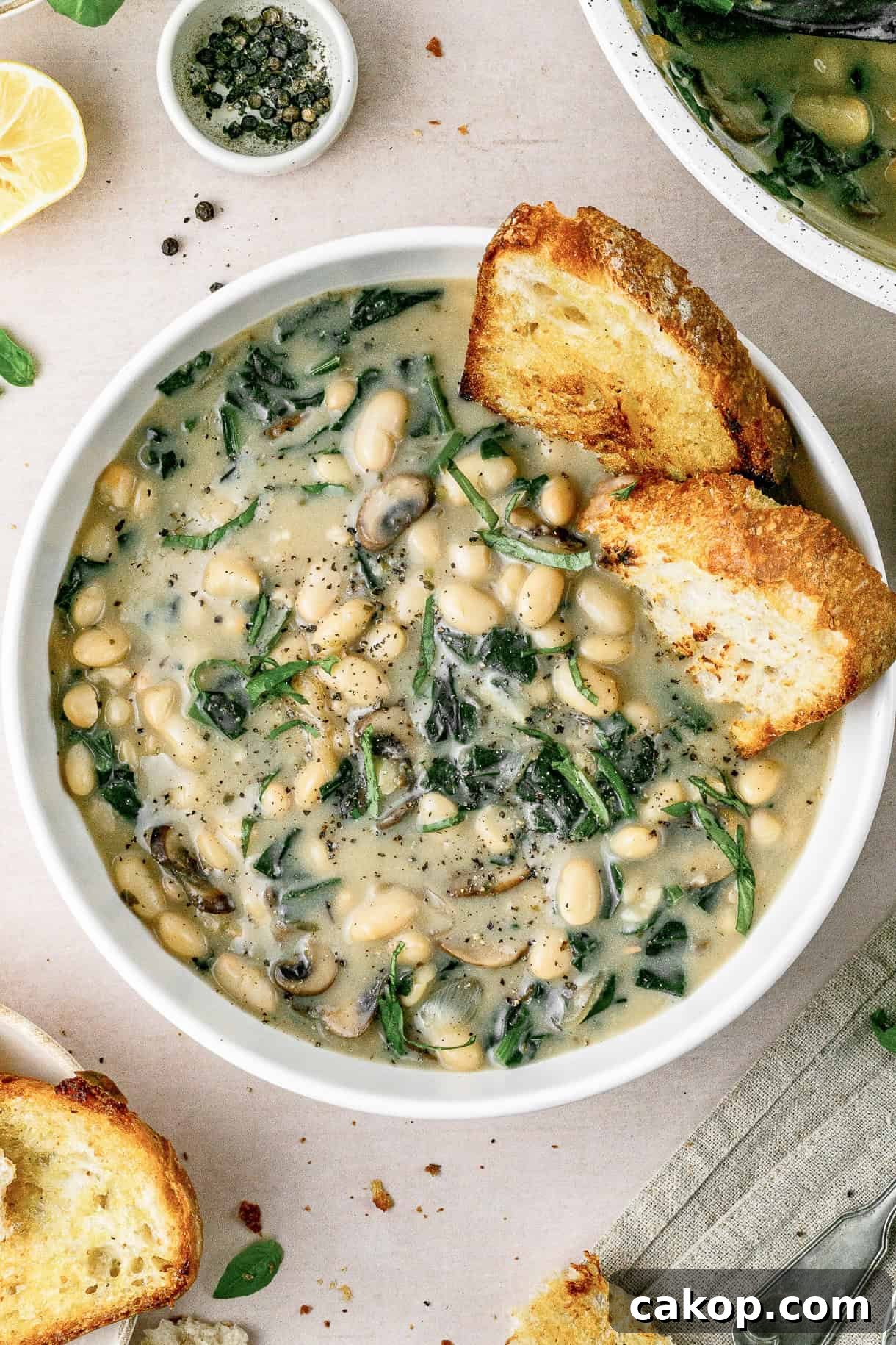 25 Comforting Winter Stews to Warm You Up 19 White Bean Mushroom Stew