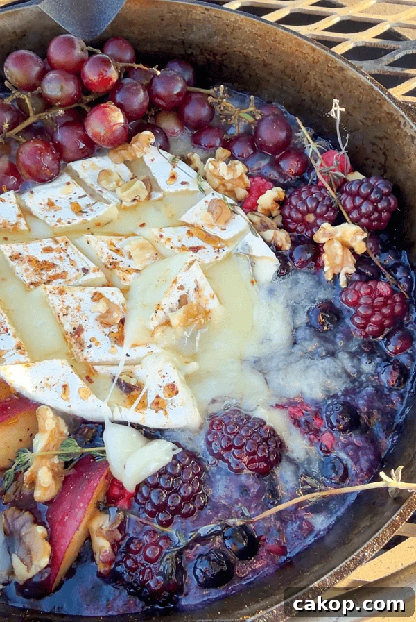 Reverse-Sear Smoked and Grilled Burgers for Juicy Results 16 Campfire brie cheese dip with berries.