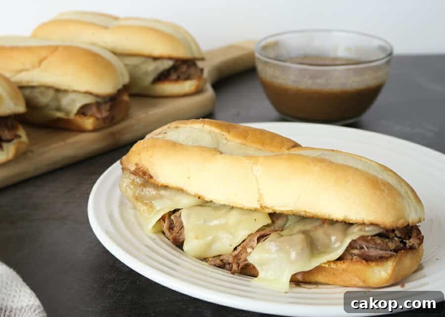 plate of Easy French Dip Sandwiches {Crockpot or Instant Pot Recipe}