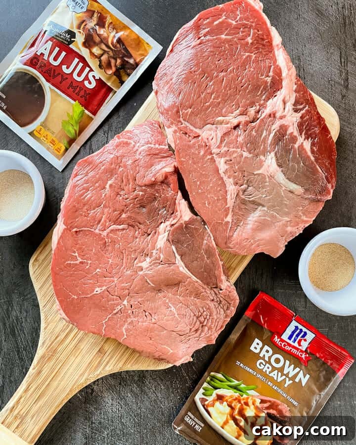 ingredients shown for the beef filling in the Easy French Dip Sandwiches {Crockpot or Instant Pot Recipe}