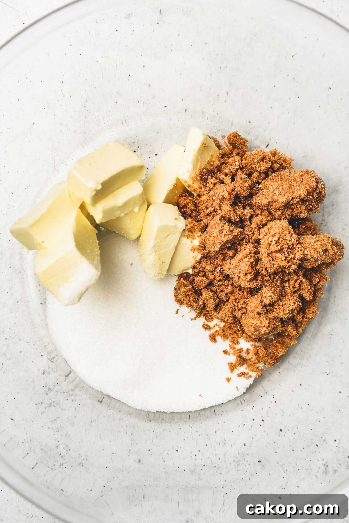 Biscoff Cookie Butter Cookies Recipe — Crunchy Spiced Biscuits 5 large bowl with butter and sugar for cookie dough