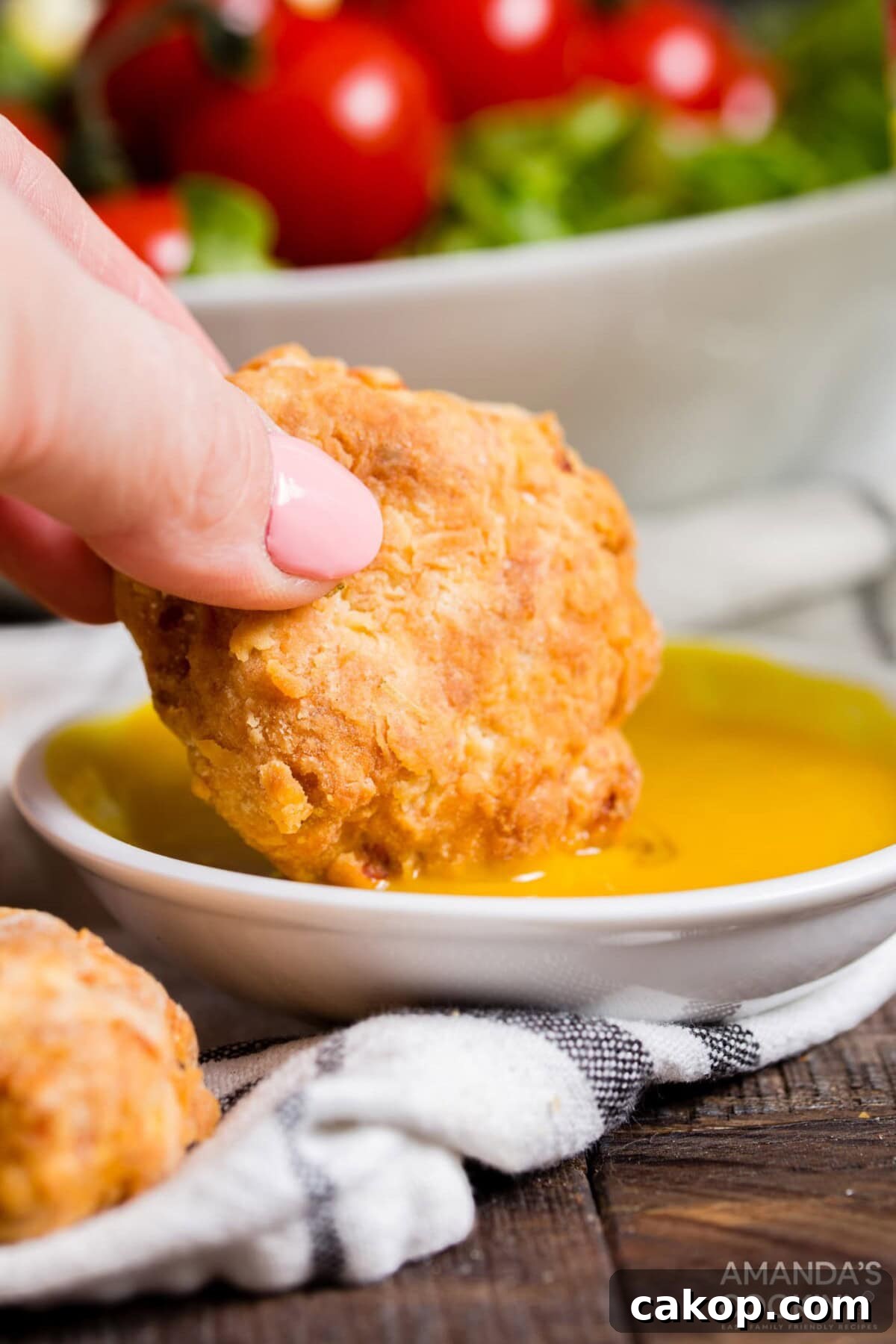 Crispy Air Fryer Chicken Nuggets Recipe for Perfect Crunch 3 dipping chicken nugget into mustard