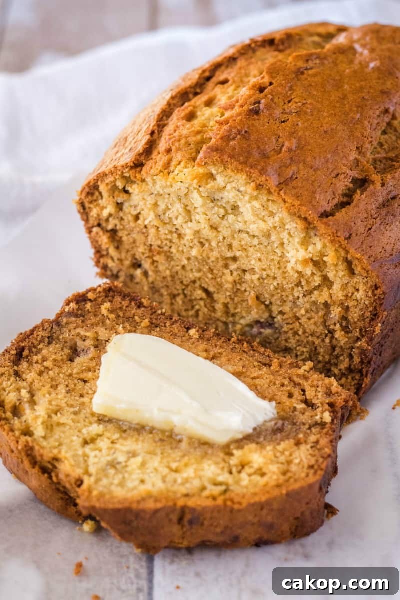 slice of banana bread with butter on top