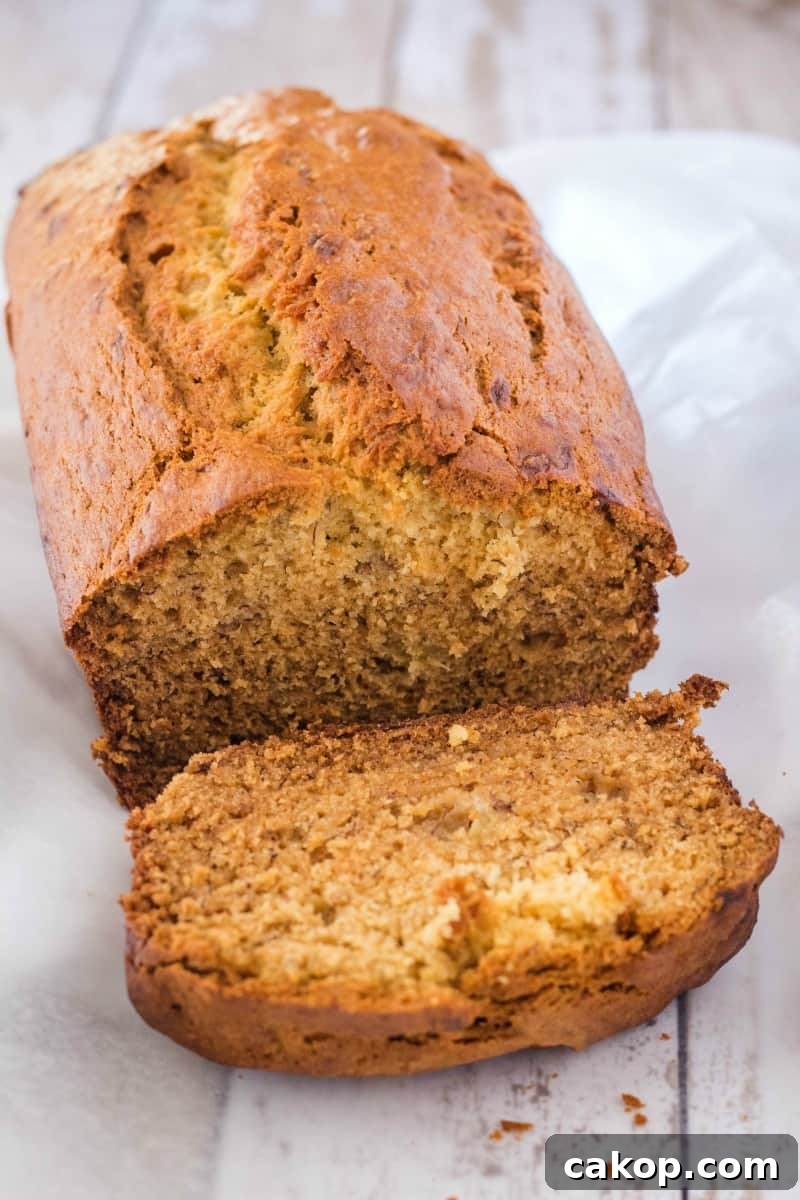 banana bread loaf with a slice cut off