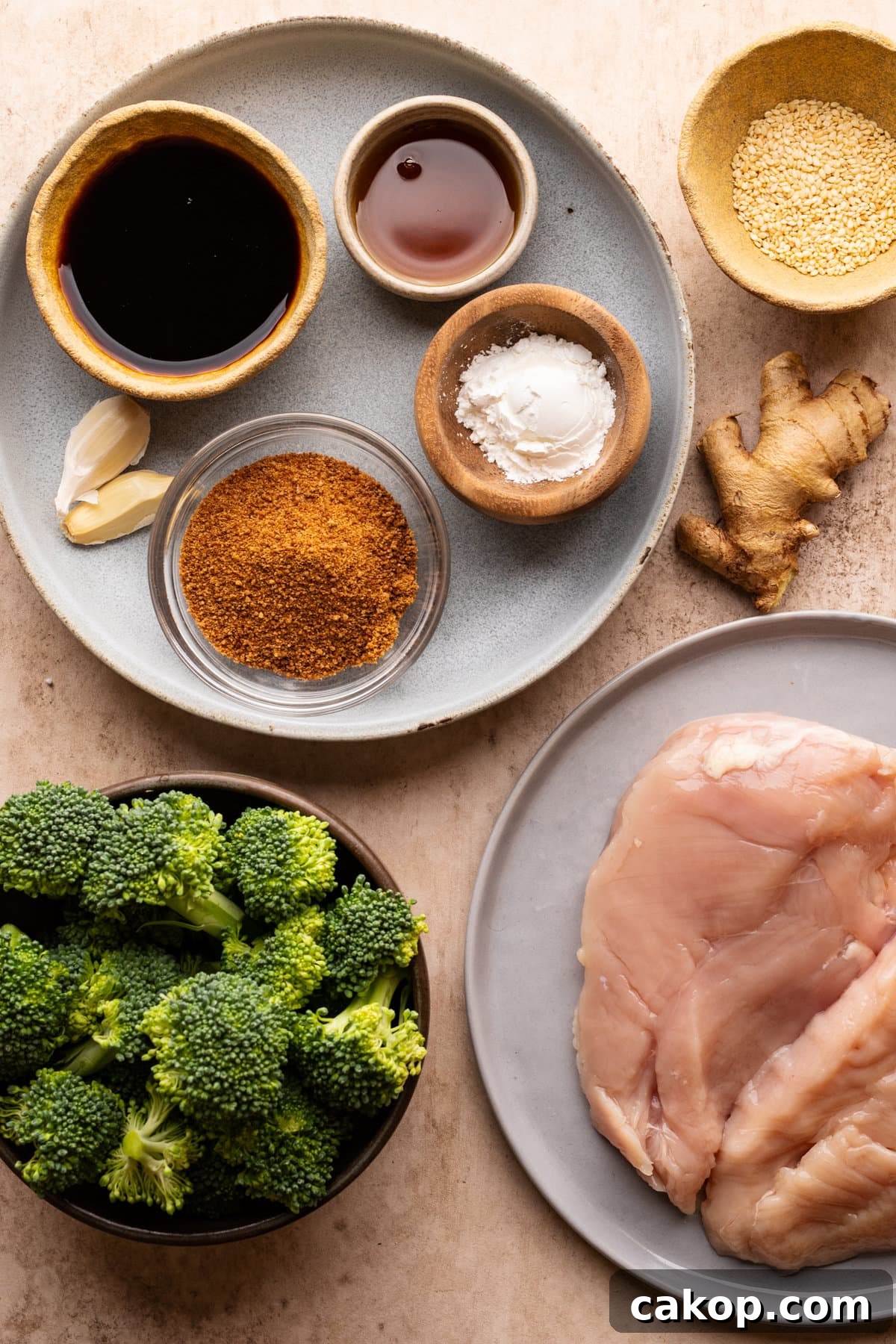Quick Teriyaki Chicken Stir-Fry Ready in 10 Minutes 3 Ingredients for teriyaki chicken stir fry arranged in bowls and plates on a tan background.