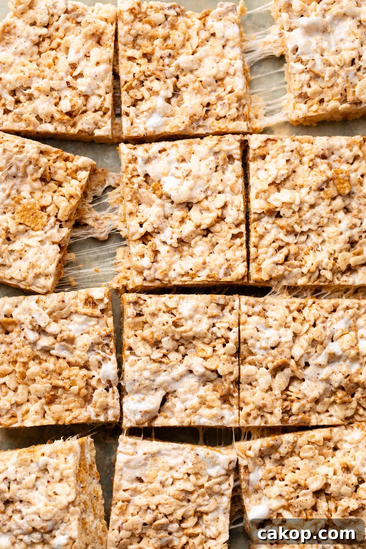golden graham rice krispies cut up on parchment paper