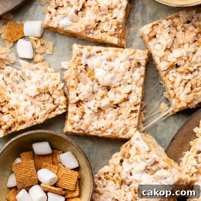 golden graham rice krispies cut up on parchment paper
