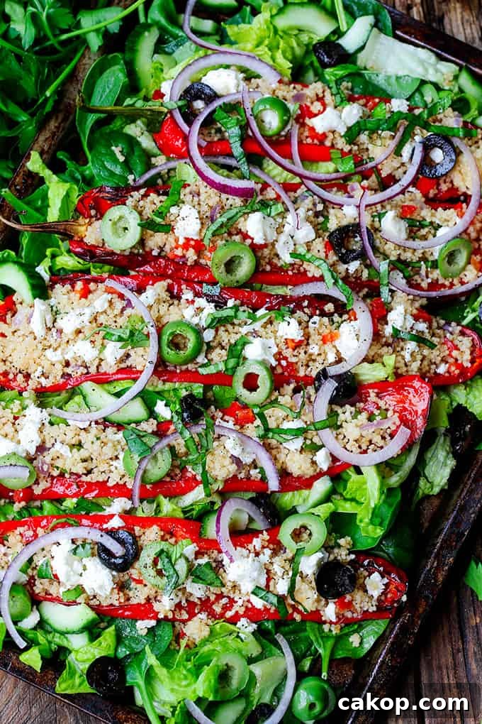 Roasted Romano Peppers Stuffed with Feta and Couscous 2 Couscous and Feta Stuffed Peppers - Serve them as a light lunch or side dish.