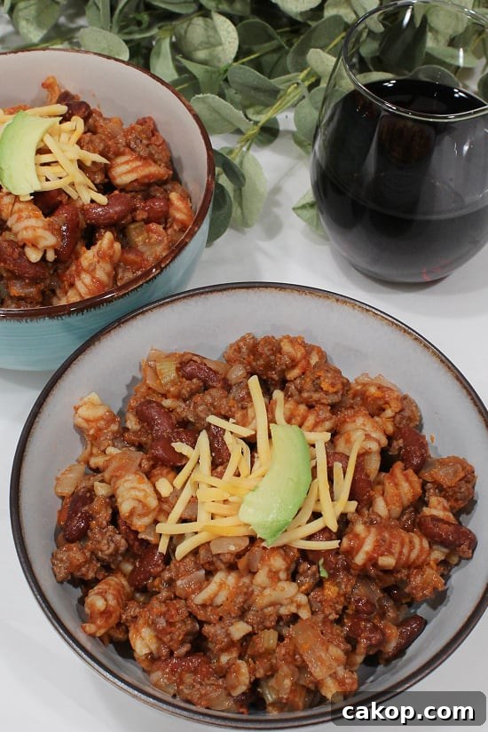 Mom's Goulash Recipe has ground beef, onion, celery, and tomato soup in this easy meal. Pasta, kidney beans, and ground beef with a tomato sauce in Mom's perfected recipe.