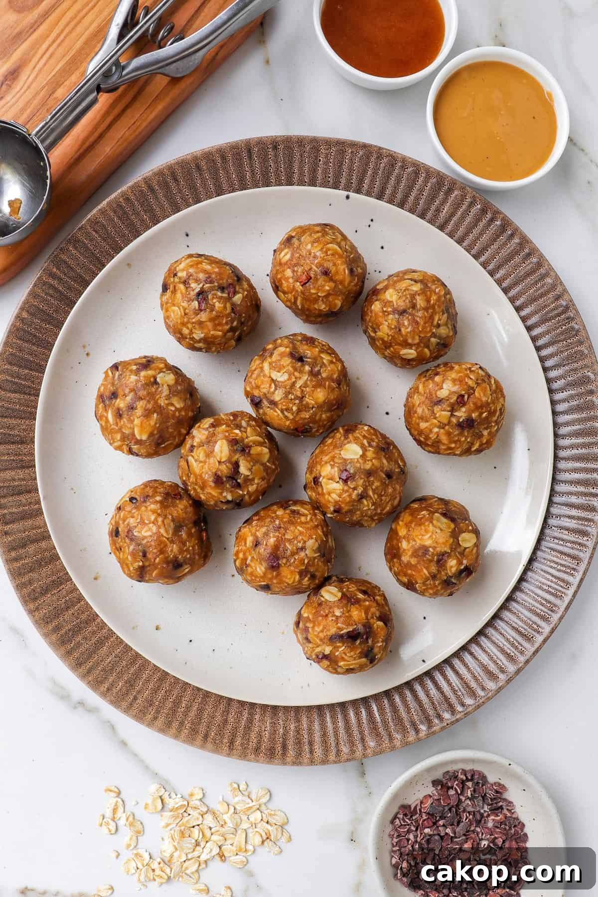 Peanut butter bliss balls on a plate.