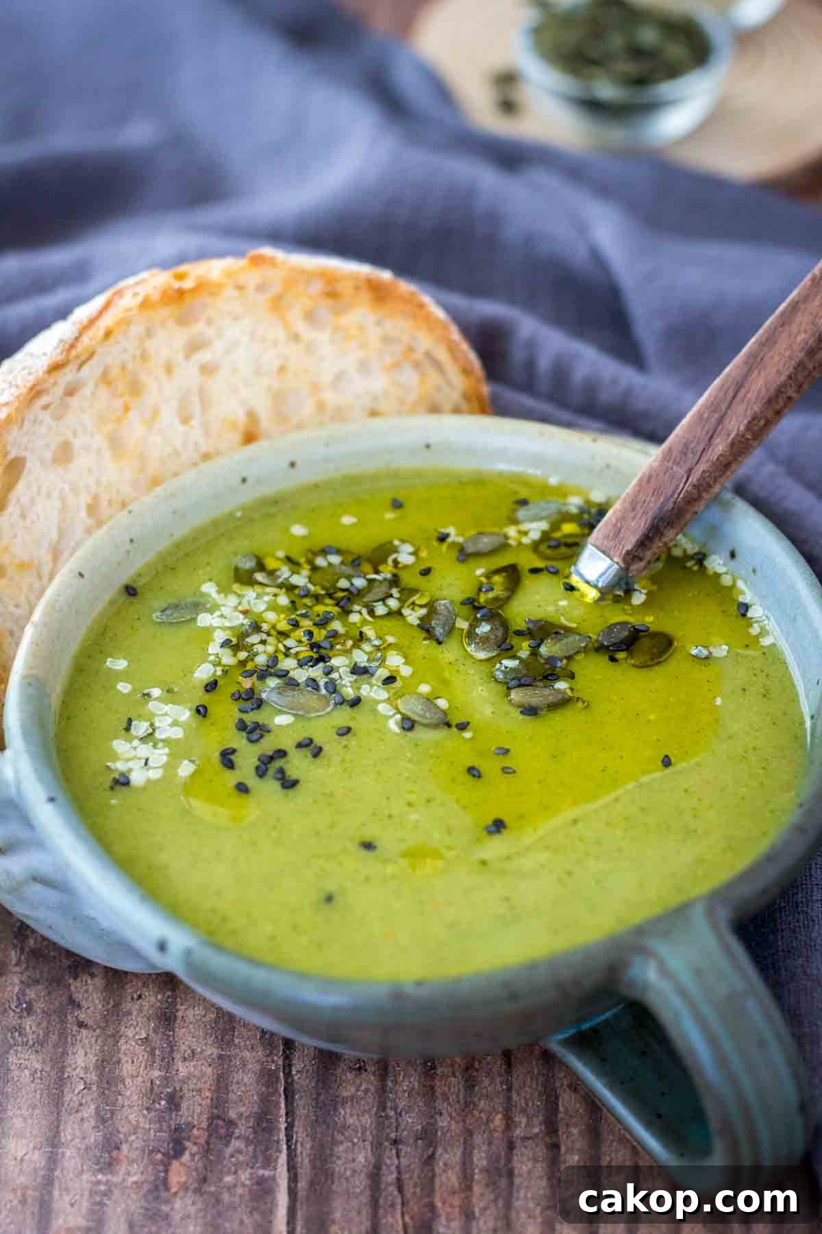 Fiery Roasted Broccoli Soup with Garlic and Chili Oil 5 Spicy Broccoli Soup served in a bowl topped with pumpkin seeds