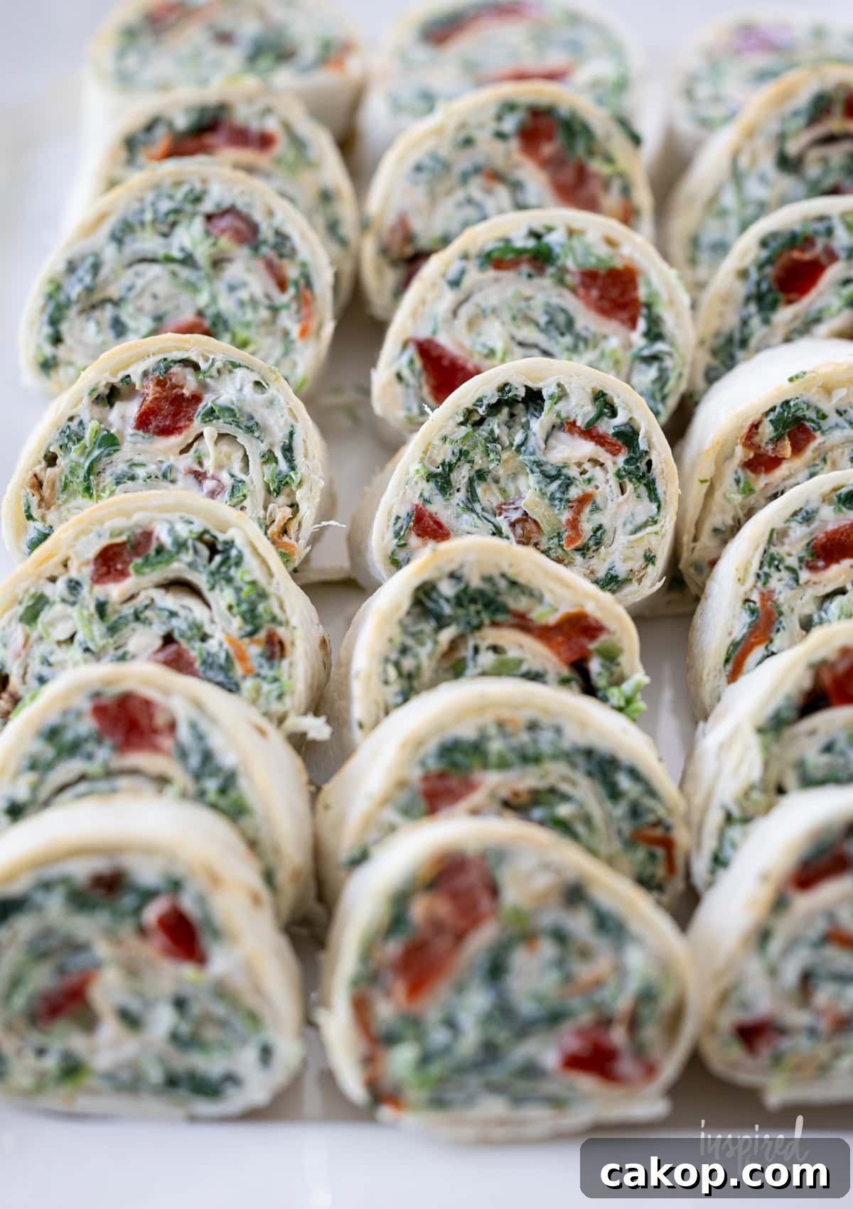 array of Spinach Dip Roll-Ups. 
