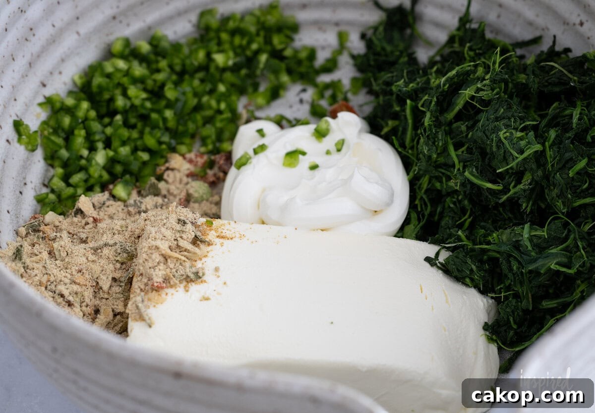 ingredients for Spinach Dip Roll-Ups in a bowl.