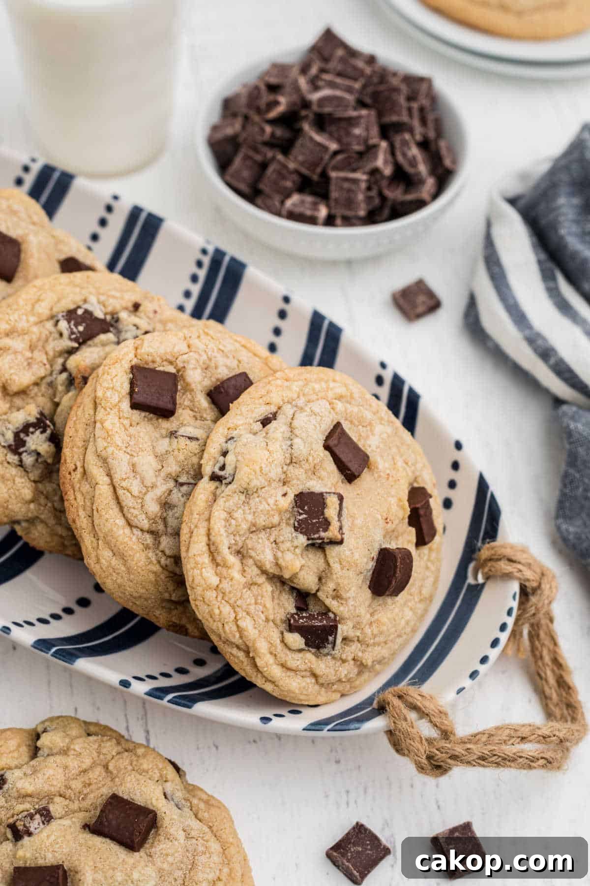 a dish full of chunky chocolate chip cookies laid out so nicely