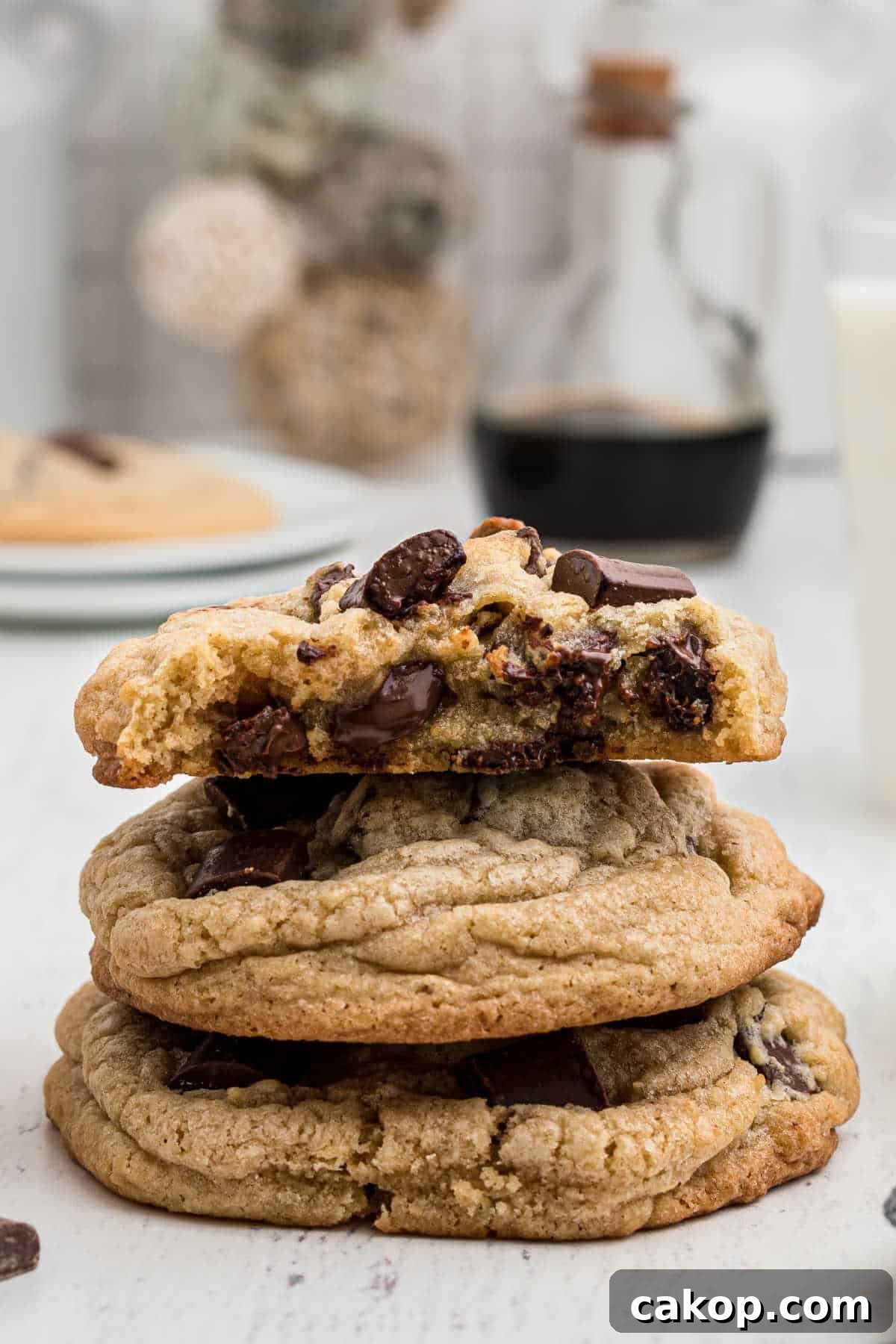 a stack of chunky chocolate chip cookies
