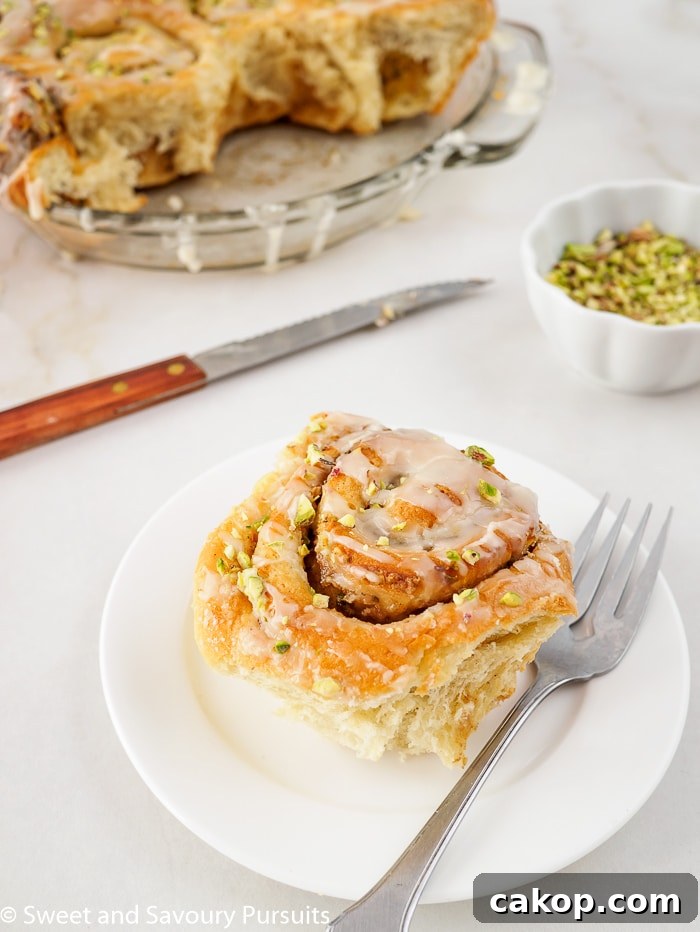 Pistachio Cinnamon Rolls Drizzled with Tahini Glaze 2 Tahini and pistachio rolls.