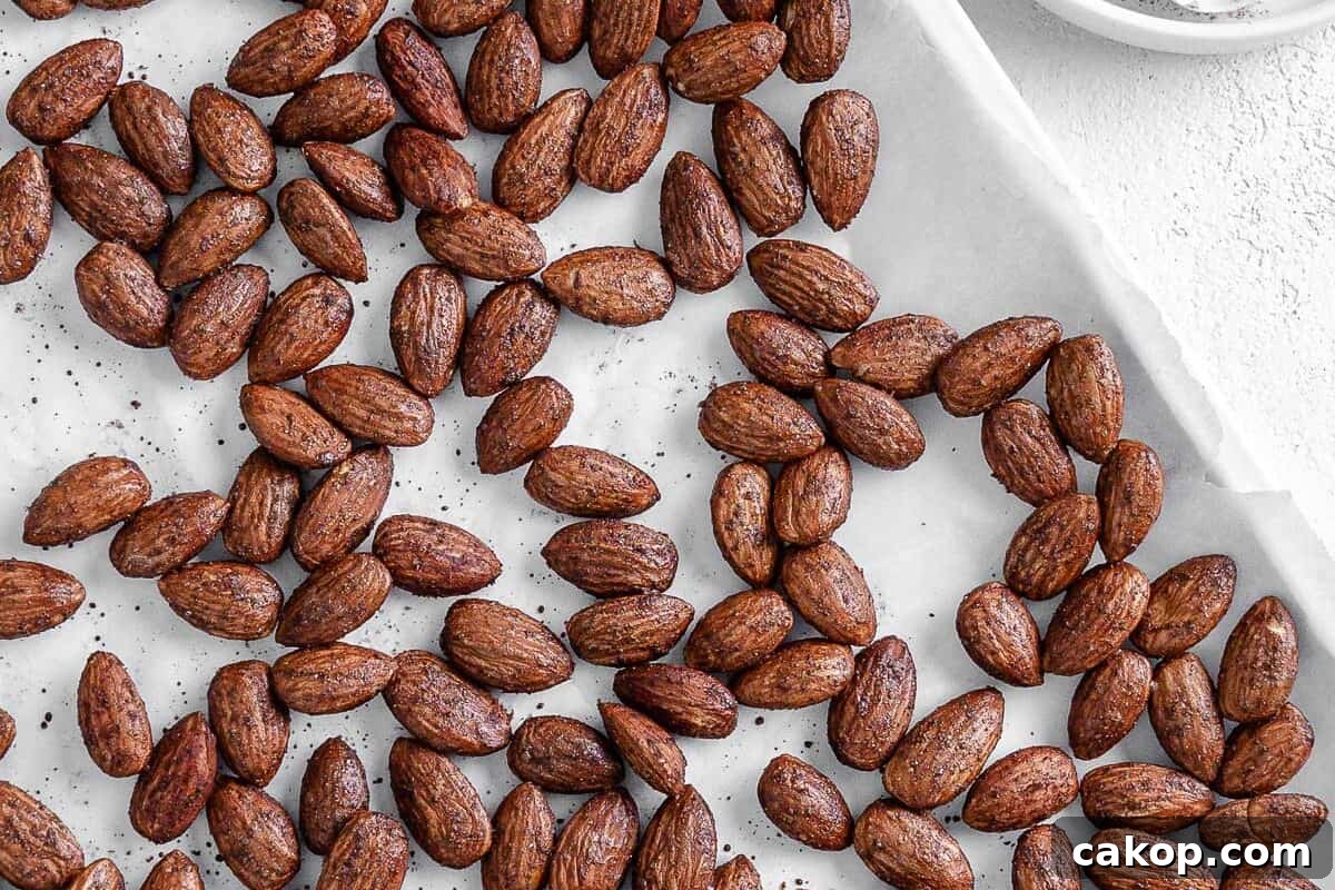 completed cinnamon almonds against a white surface