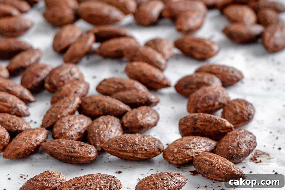 completed cinnamon almonds against a white surface