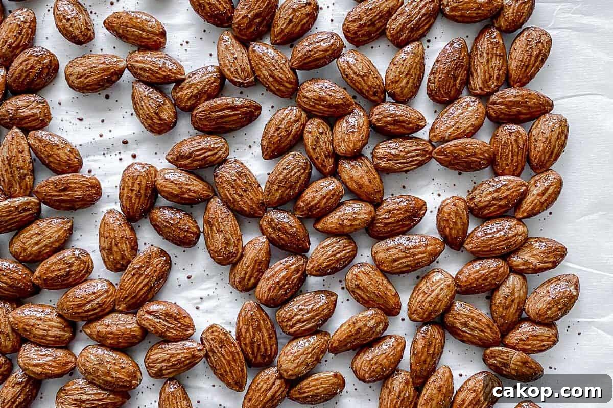completed cinnamon almonds against a white surface