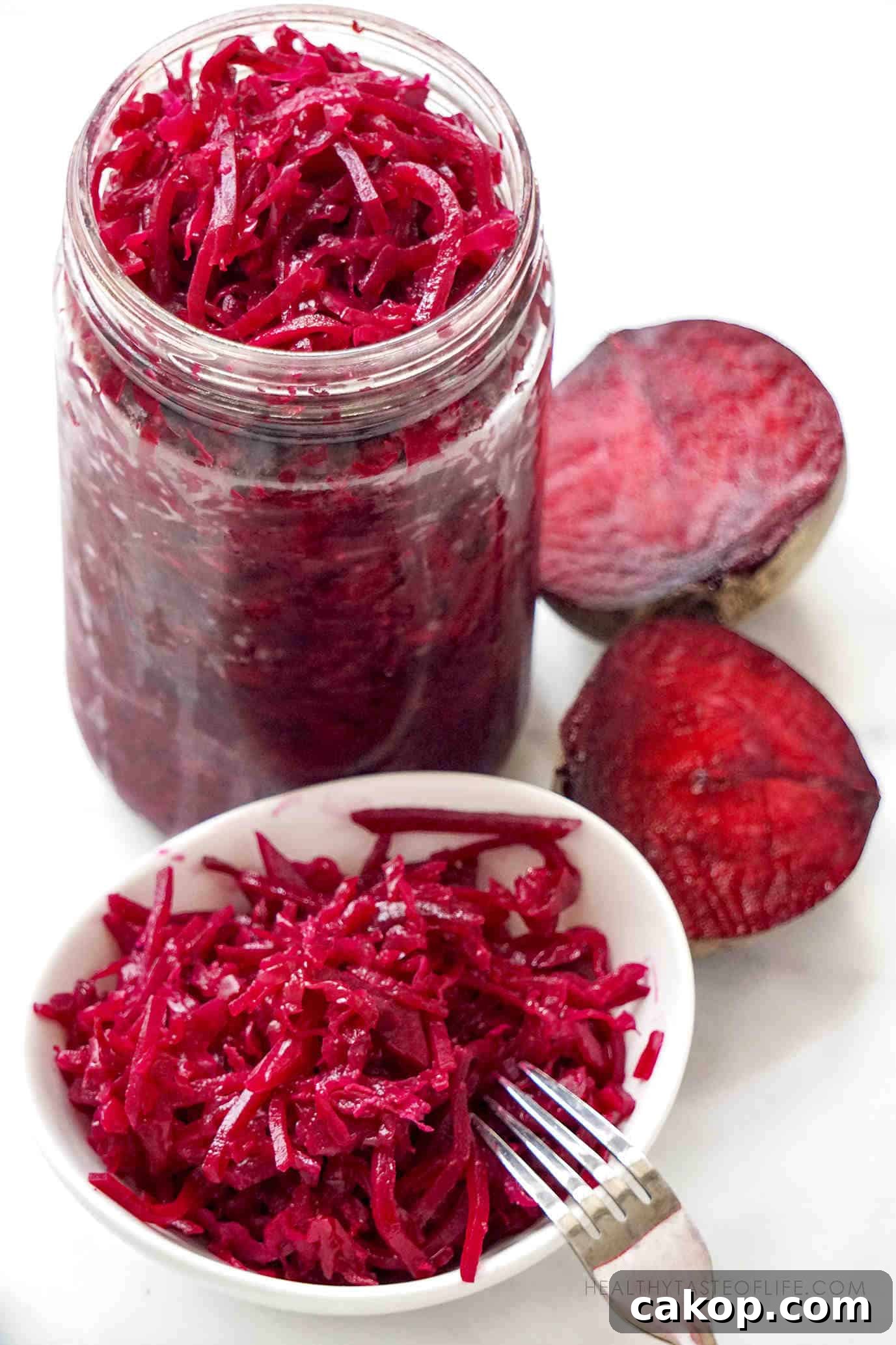 Beet sauerkraut with red cabbage recipe - an easy recipe to lacto ferment beetroot and cabbage - beneficial for the gut health and immune system.
