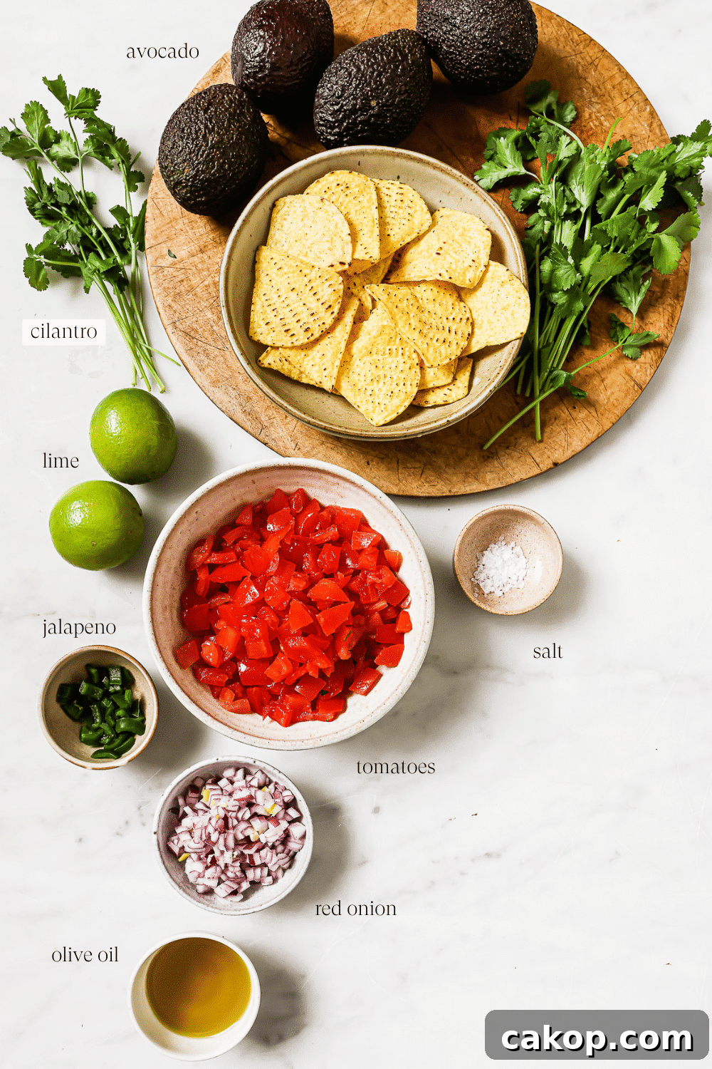 Pre-measured ingredients for avocado salsa.