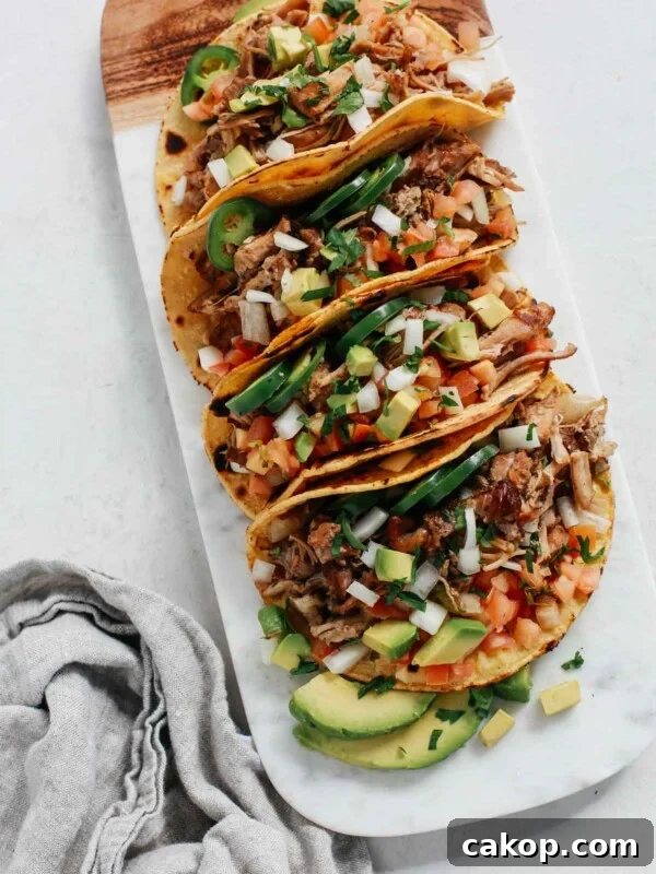 tray of slow cooker carnitas tacos
