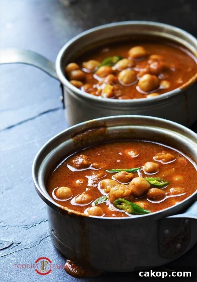 Instant Pot Chana Masala served in two small aluminum saucepans
