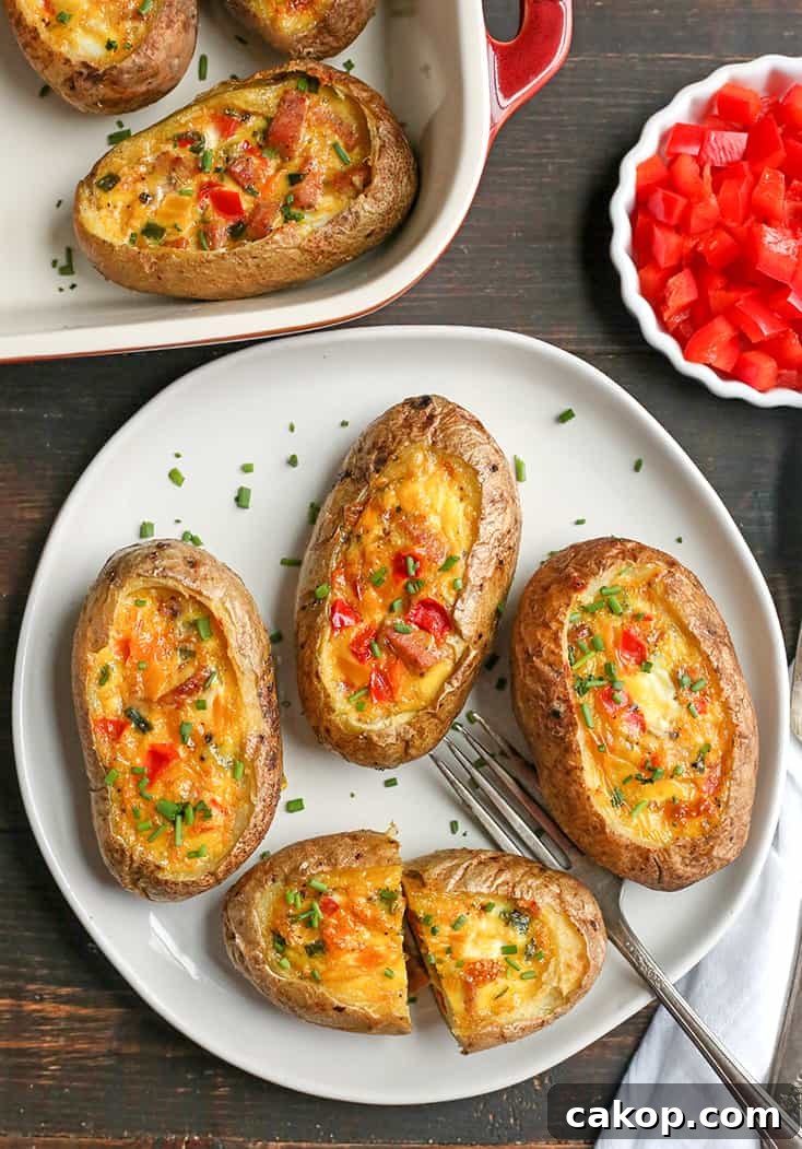 These Paleo Whole30 Egg Potato Boats are a fun and filling breakfast. Packed with sausage, peppers, green onions and of course eggs. They are gluten free, dairy free, and low FODMAP.