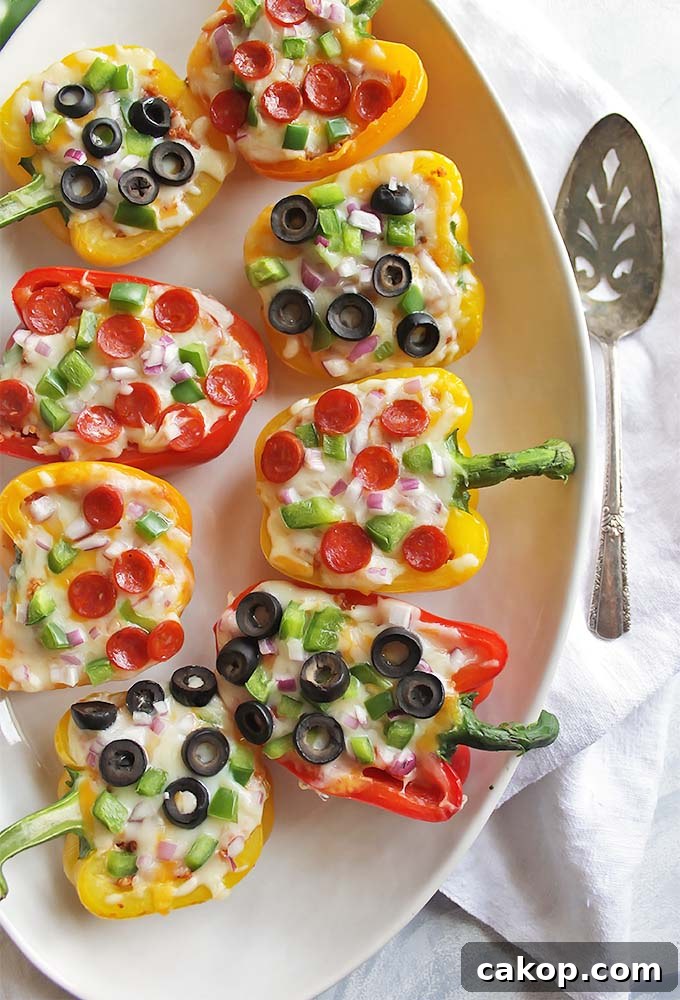35 Minute Pizza Stuffed Peppers - Healthy stuffed pizza peppers that come together in 35 minutes. You can use any of your favorite pizza toppings you prefer. This recipe is a fun way to get your "pizza" fix! Husband approved! Gluten free | robustrecipes.com