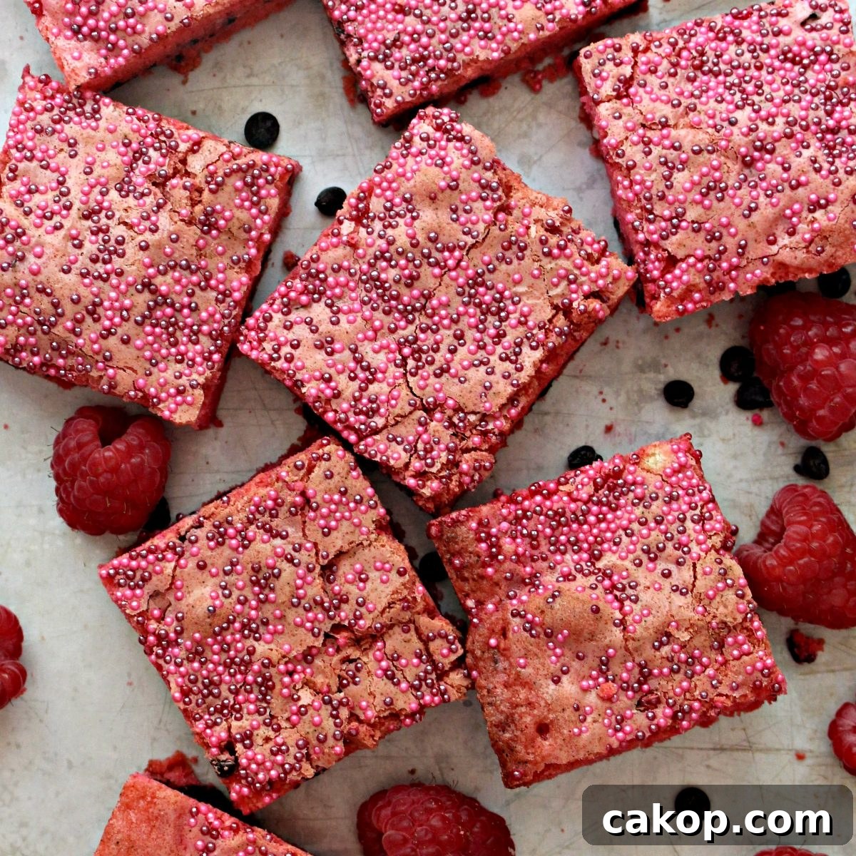 Closeup of Raspberry Chocolate Chip Bars. Closeup of Raspberry Chocolate Chip Bars with red and pink nonpareil sprinkles on top.