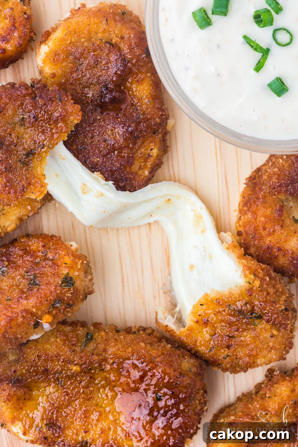 Nashville Hot Mozzarella Sticks (copycat Chili's recipe!). The ultimate appetizer. Cheesy, crispy, gooey, spicy, and totally irresistible!