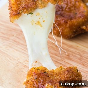 Nashville Hot Mozzarella Sticks (copycat Chili's recipe!). The ultimate appetizer. Cheesy, crispy, gooey, spicy, and totally irresistible!