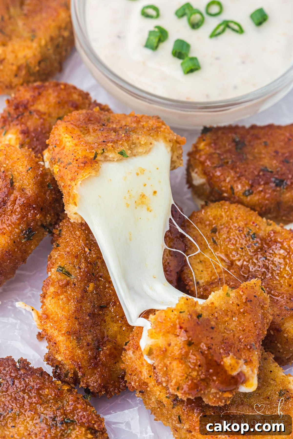 Nashville Hot Mozzarella Sticks (copycat Chili's recipe!). The ultimate appetizer. Cheesy, crispy, gooey, spicy, and totally irresistible!